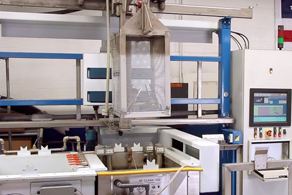 An automated passivation system for stainless steel parts.